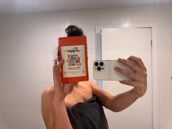 Bathroom mirror selfie holding Sippo Mint Condition body scrub